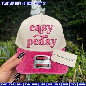 May include: A baseball cap with a cream-coloured crown and a magenta brim. The words "easy peasy" are embroidered in magenta on the front. The cap has a tag that says "LittleLoomDigital".