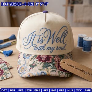 May include: Cream-colored baseball cap with the embroidered phrase "It is Well with my soul" in light blue script. The brim features a floral pattern. A small purple button is on top. The tag reads "Little Loom Digital".