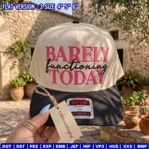 May include: A beige and black baseball cap with the text "BARELY functioning TODAY" in pink and black. The cap has a flat brim and a tag that says "LittleLoomDigital".