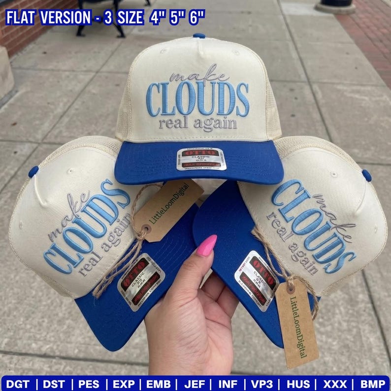 May include: Cream-colored trucker hats with blue brims and the embroidered phrase "make CLOUDS real again." The hats have a mesh back and a curved brim. The image also shows tags that say "LittleLoomDigital".