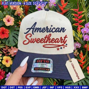 May include: A baseball cap with a cream-colored crown and a navy blue brim. The cap features the embroidered text "American Sweetheart" in navy and red, with three red stars. The tag reads "LittleLoomDigital".