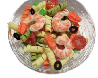Pretend felt food...shrimp and pasta salad.