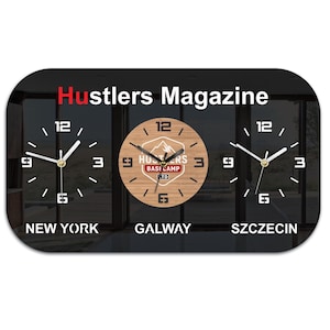 May include: A rectangular wall clock with rounded corners featuring three clock faces. The top text reads Hustlers Magazine. The left clock is labelled New York, the centre clock features a wood grain design with a mountain logo, and the right clock is labelled Szczecin. The centre clock is also labelled Galway.