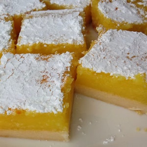 1 Pound of Homemade Lemon Squares Topped with Powdered Sugar; Lemon Bars