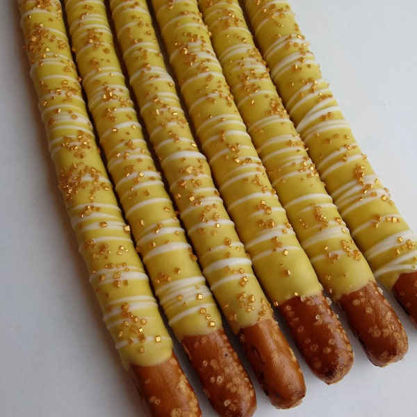 12 Yellow Chocolate Covered Pretzels with White Chocolate Drizzle and Gold Sprinkles