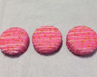 12 Pink Chocolate Covered Oreo Cookies with White Chocolate Drizzle and Gold Sprinkles