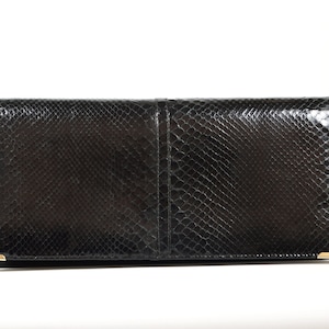 Elegant Black Handbag Exotic Leather Clutch at Night About
