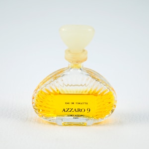 Miniature bottle of AZZARO 9 Eau de Toilette. Loris Azzaro Paris. Small collection jar. Original Vintage