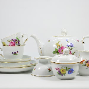 Fürstenberg brand porcelain set. White porcelain with flowers. Tea or Coffee Set for 2 people. Antiquity