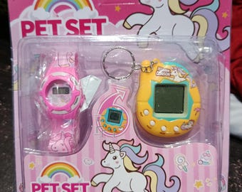 TAMAGOTCHI バーチャルペット ピンク Tamagotchi Pix - Floral (Pink) Electronic Pet with: Original