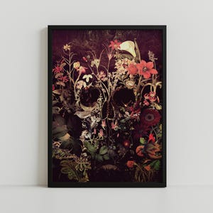May include: A dark, abstract skull-shaped image made of flowers and foliage. The skull is formed by a variety of flowers in shades of red, pink, and white, with green leaves and vines. The background is a dark, almost black, color.