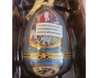 Caja de baratijas con adorno de huevo musical de Mr Christmas, Papá Noel
