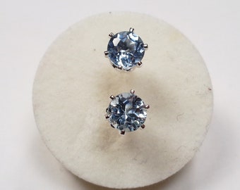 Gorgeous, 5mm., Icy Blue Topaz Earrings in Sterling Silver. 1.24 Carat Total Gem Weight.