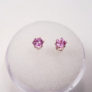 Pink Sapphire Earrings in set in Sterling Silver.  Genuine, 3mm, round cut Sapphire earrings