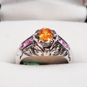 Orange Sapphire Ring: 18kt White Gold with Pink Sapphires