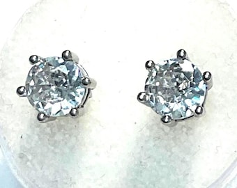 Moissanite earrings set in Sterling Silver.  Genuine, 7mm., double reflectivity, round cut earrings.