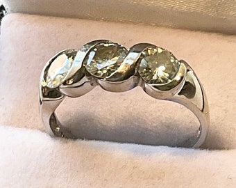 14kt. Gold, Moissanite Ring. Set in a 14kt. White Gold Ring.