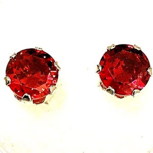 Ruby Earrings set in Sterling Silver.  6mm, Round cut, lab