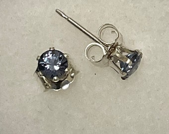 Sapphire Earrings.  3mm., blue steel color set in Sterling Silver.  Genuine stones and silver.  Perfet for day or evening.