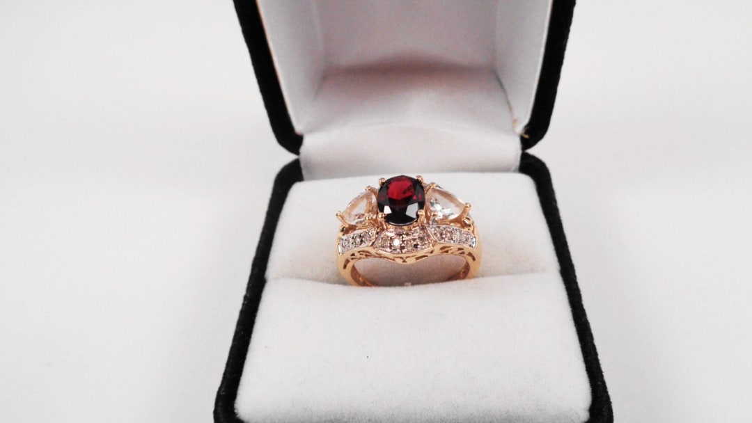 14kt. Gold Garnet Ring. Garnet Oval in a 14kt Gold Ring With Topaz and ...