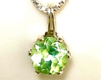 Mint green Sapphire pendant.  Natural, 6mm, Set in Sterling Silver with 18" chain necklace.