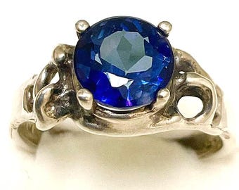 Patriot Blue Topaz Ring.  Natural, 7mm stone, set in Sterling Silver.  Size 6