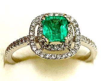 Genuine Emerald Ring with double halo of Diamond accents.  Size 6.5