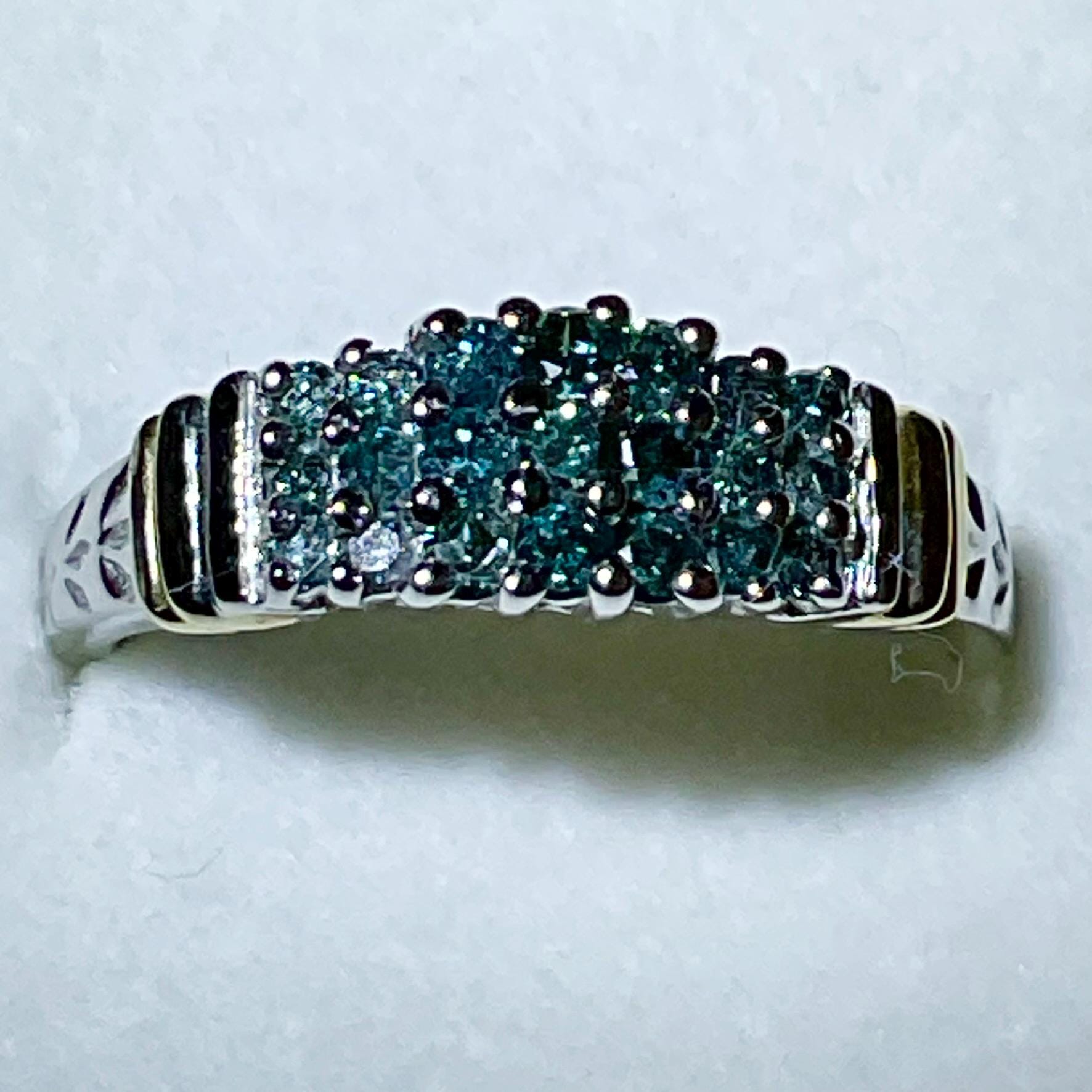 Diamond Ring.  14kt. Gold with .50ctw of Blue Diamonds in a Leaf Band Cluster Ring