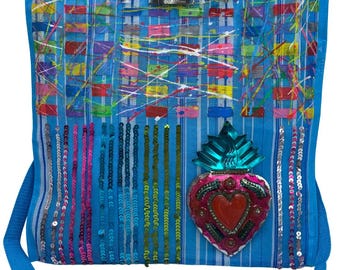 handmade brass and hand painted heart bag