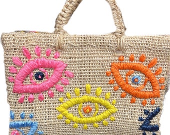 Bolsa de henequén con múltiples mal de ojo