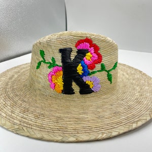 Personalized straw hat.