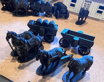 May include: A collection of black 3D printed miniature figures including horses, horse-drawn wagons, and carts. The set features multiple horses standing on oval bases, wagons loaded with small barrels, and empty carts with spoked wheels.