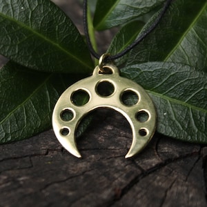Brass crescent moon pendant