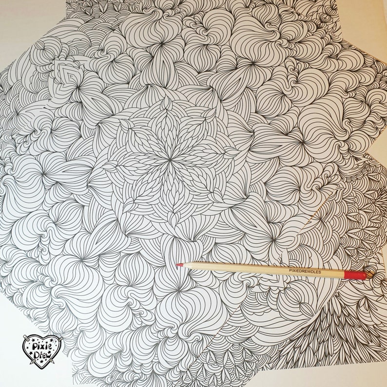May include: A black and white intricate line drawing of a mandala with a pencil on top of it. The drawing is on a white background.
