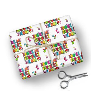 May include: White gift wrap with a repeating pattern of colourful stars and the phrase "You're my favourite knob" in a playful, cartoon font.