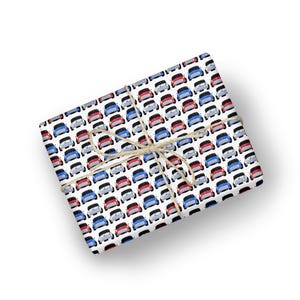 May include: White wrapping paper with a repeating pattern of red, blue, and white cars. The paper is tied with twine.