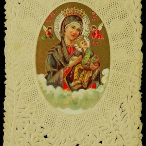 Notre-Dame du Perpétuel Secours, dentelle antique, petit canivet en relief, angelots