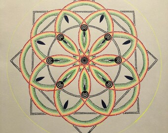 May include: A colorful mandala design created with dots of paint. The mandala features a central circle with a black and white pattern, surrounded by concentric circles of red, orange, yellow, green, and blue dots. The mandala is framed by a square and a circle.