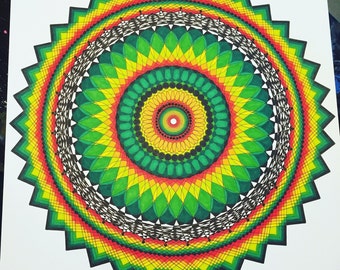 May include: A colorful mandala with a black and white center surrounded by concentric circles of red, yellow, and green.