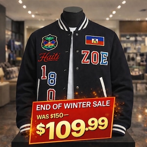 May include: Black varsity jacket with white stripes on the collar and cuffs. Features patches with the word "Haiti", the number "18", and the name "ZOE". A red sign displays "END OF WINTER SALE".