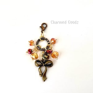 Swooshing Bow travelers notebook charm, planner spine charm, travelers notebook accessories,