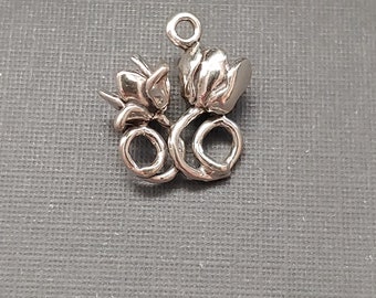 Limited edition sterling silver double tulip flower charm measuring 18x16mmmm. Weight of charm is 3.52 grams.