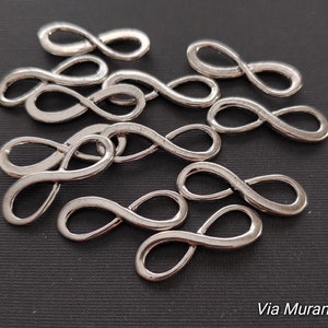 Tennfigur åtta-koppling 8 x 23 mm (12-pack)
