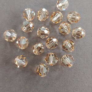 SWAROVSKI #5000 Round Bead 8mm Golden Shadow AB (18 Pieces)