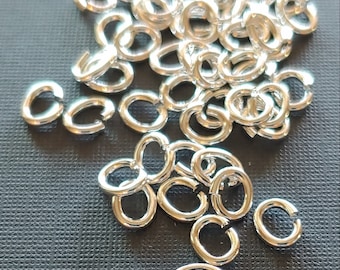 SNAPEEZ® "The Snapping Jump Ring" Silver Oval Jump Ring Hard Open Locking Jump Ring 6x4mm Heavy Gauge. Made in USA.