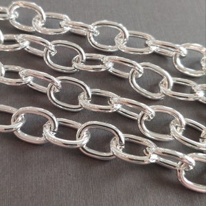 14x10mm Silver Plated Unsoldered Oval Brass Chain.  Made in the USA.  Oval brass link chain sold by the foot. Use 10mm or 12mm Snapeez!