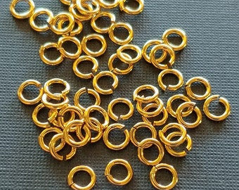 SNAPEEZ® "The Snapping Jump Ring" 24 kt. Gold Ring Hard Open Locking Jump Ring 4mm Heavy Gauge. Made in USA.