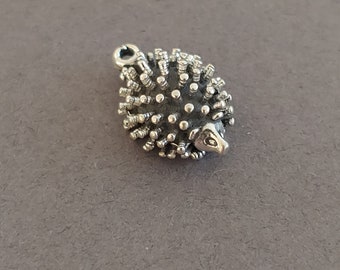 Limited edition sterling silver hedgehog charm measuring 14mm x 11mm. Weight of charm is 1.92 grams.