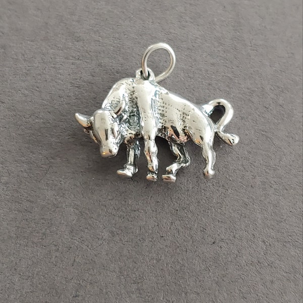 Limited edition sterling silver bull charm measuring 25x16mm. Weight of charm is 5.0 grams.