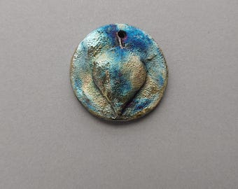 RAKU pottery ceramic round pendant 29mm.  Made in USA.